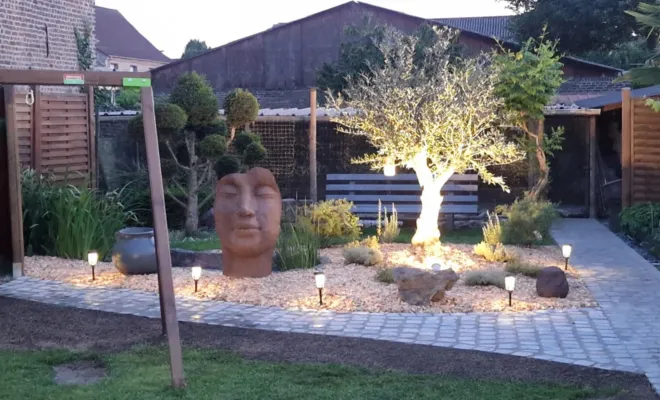Création paysagère à Quarouble avec pose d'un Olivier et pavage d'allées, Douai, Les Jardins de Jo